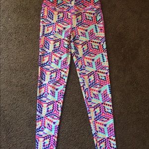 A colorful exercise top and legging matching set.